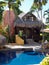 Luxury palapa roof bungalow near pool