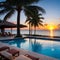 A luxury pool sunset with a palm tree silhouette.