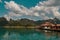 Luxury raft houses resort on Cheow Lan lake in Khao Sok National Park, Thailand. Postcard, poster, wallpaper