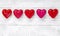 Luxury red hearts on white wooden background. Happy Valentines day. Glitter love confetti.