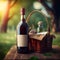 Luxury red house wine bottle and vintage picnic basket in the sunny countryside background, blank empty lable for mockup