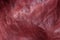 Luxury red leather background closeup