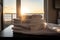luxury resort, with view of the ocean and sunset, featuring stack of freshly washed towels and linens