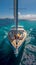 Luxury sailing Yacht on serene blue sea, offering vacation recreation