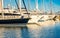 Luxury sailing yachts boats moored at marina