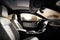 luxury sedan with captivating lighting, sleek dashboard and comfortable, ergonomic seats