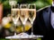 Luxury service, glasses of champagne served by a waiter at a wedding celebration or event in formal English style at luxurious