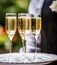 Luxury service, glasses of champagne served by a waiter at a wedding celebration or event in formal English style at luxurious