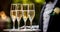 Luxury service, glasses of champagne served by a waiter at a wedding celebration or event in formal English style at luxurious