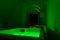 Luxury travel Santorini vacation hotel jacuzzi in colored lights with night view of the city.