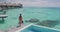 Luxury Travel Vacation in Tahiti. Snorkel swim woman going snorkeling