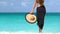 Luxury Travel Woman Holding Sunhat At Beach - Summer Travel Holidays