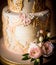 Luxury wedding cake, exclusive high-end design, beautifully decorated professional multi tier premium cake as main