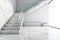 Luxury white marble L shape stairway with glass. Interior background