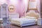 Luxury white and pink bedroom in antique style with rich decor . Interior of a classic style bedroom in luxury apartment