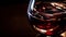 Luxury wineglass reflects dark cabernet sauvignon grape elegance generated by AI