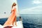 Luxury woman pareo yachting in sea with blue sky sunlight