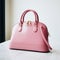 Luxury Women Side View of Pink Genuine Full Grain Leather Lady Bag. Women's Top Handle Shopper Tote Bag Padlock