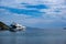 Luxury yacht moored in the middle of the blue calm sea. Kea, Otzias, Greece