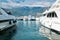 Luxury yacht ships at sea harbor near mountains landscape