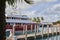 Luxury Yachts Docked at Tropical Marina with Palm Trees