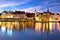 Luzern Kapelbrucke and riverfront architecture famous Swiss landmarks evening view