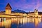 Luzern Kappelbrucke bridge and church with Pilatus mountain back