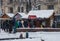 Lviv downtown, Christmas time People walking in historical part city, market. Winter time, snow