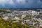 Lviv Lvov Lemberg city downtown view from mount on High Castle Hill on spring day. Dramatic sky. Ukraine