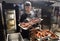 Lviv, Ukraine - April 1, 2022: Employees of a local restaurants together with the World Central Kitchen organization prepare food