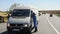 Lviv, Ukraine - April 10, 2020: A medical worker checks temperature of  a driver on a checkpoint on the entrance to Lviv region,