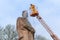 LVIV, UKRAINE - April 16, 2018: Cleaning expert clean the monument to Ivan Franko.