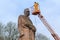 LVIV, UKRAINE - April 16, 2018: Cleaning expert clean the monument to Ivan Franko.