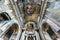 LVIV, UKRAINE - AUGUST 2019: interior dome and looking up into a old gothic or baroque uniate church ceiling and vaulting