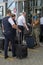 Lviv, Ukraine, August 22, 2020; at the entrance to the airport building, a military medic measures the temperature with a non-cont