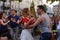 Lviv, Ukraine - June 9, 2018: Salsa dancers in outdoor cafe near Diana fountain at Market square in Lviv