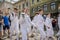 LVIV, UKRAINE - MAY 2018: Team of sportsmen in fencing goes in sports suits in the center of the city at the parade