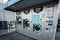 Lviv, Ukraine - October 09, 2022: Washing machine and dryer self service laundry, laundromat