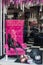 Lviv, Ukraine, October 2018: A colourful Halloween display in a shop window in Lviv. Human black Skeleton sits in a Pink Velvet