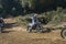 Lviv, Ukraine - October 2021: Athletes motorcycle racers compete in motocross competition on the race track