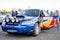 Lviv, Ukraine - Otober 2015: A racing car for the rally in a closed garage before the start of the race which sets up a mechanic a