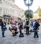 Lviv, Ukraine - September 2015: Band of guys playing guitars and singing in the Market Square in the street in Lviv