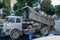Lviv, Ukraine - September 2015: Truck unloads gravel road reconstruction on Liberty Avenue in Lviv