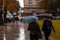 LVIV, UKRAINE - September 7, 2018: rain in city. people walking with umbrella