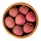 Lychee or litchi fruits in wooden bowl over white