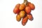 Lychee. A tall evergreen tree, the lychee bears small fleshy fruits