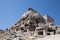Lycian rock tombs over blue sky, location Tlos Ancient City, Turkey