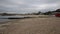 Lyme Regis beach Dorset England UK waves lapping the shore