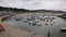 Lyme Regis harbour Dorset England UK with boats moored