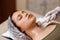 Lymphatic drainage massage LPG apparatus process. Therapist beautician makes a rejuvenating facial massage for the woman